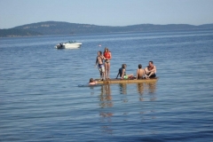 Kids-and-their-uncle-on-raft-min